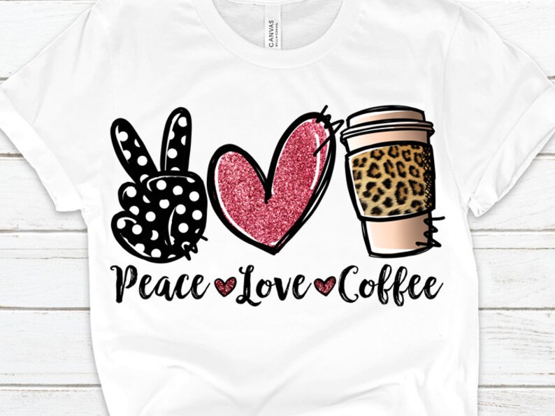 May include: White t-shirt with a black peace sign with white polka dots, a pink glitter heart, and a coffee cup with a leopard print sleeve. The text "Peace Love Coffee" is printed below the images.