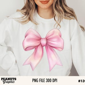 May include: A pink bow with a satin finish. The bow is tied in a knot and has a soft, feminine look.