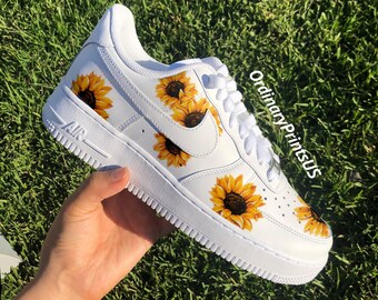 black nikes with sunflower design