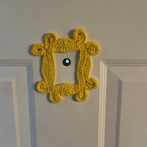 Vänners titthålsram eller grytunderlägg