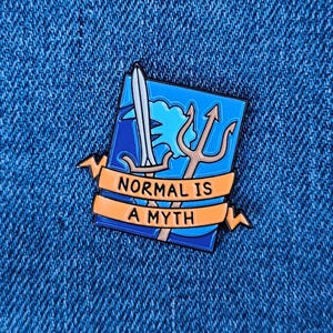 May include: A blue and orange enamel pin with a trident and sword, and the text "NORMAL IS A MYTH".