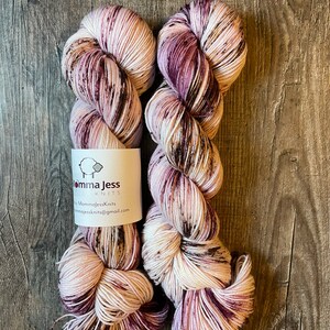 Hand dyed fingering/sock weight yarn, “Snow Covered Petals”