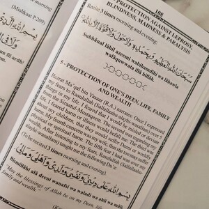 May include: A page from a book with Arabic text and a section titled "Protection of One's Deen, Life, Family and Wealth". The text discusses the importance of seeking protection from harm and illness. The page is yellowed with age and has a worn, vintage look.