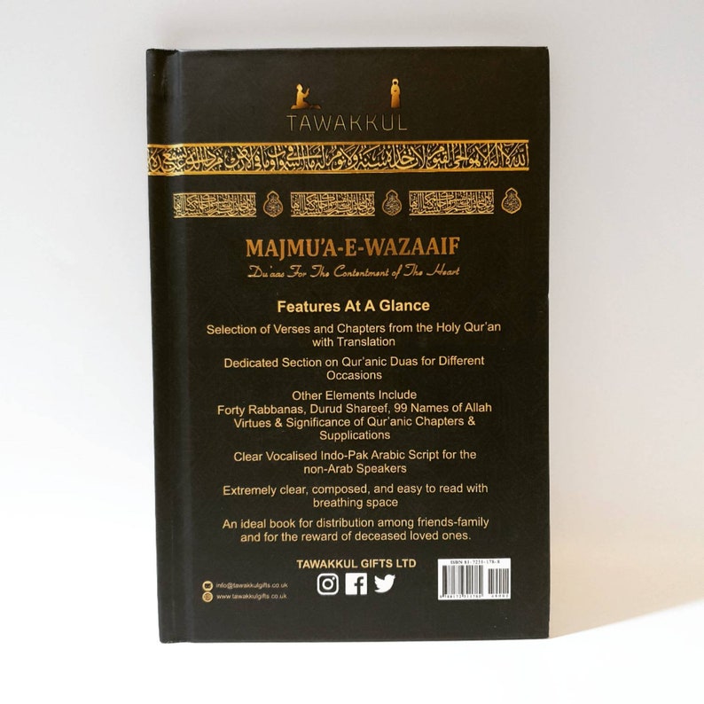 May include: A black book with gold lettering on the cover. The title is "Majmua-E-Wazaaif" and the subtitle is "Du'aas For The Contentment of The Heart". The book features a selection of verses and chapters from the Holy Quran with translation, dedicated sections on Qur'anic Duas for different occasions, forty Rabbanas, Durud Shareef, 99 Names of Allah, virtues and significance of Qur'anic chapters and supplications, clear vocalized Indo-Pak Arabic script for non-Arab speakers, and is easy to read.
