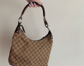 black gucci hobo purse