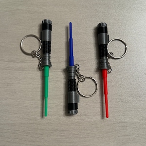 Compact Lightsaber Keychain - Be Prepared for Any Battle
