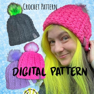 May include: Image of a digital crochet pattern for a cozy beanie. The image shows three beanies in gray, pink, and purple, each with a fluffy pom-pom. The text "TAKING BACK COZY BEANIE CROCHET PATTERN" and "DIGITAL PATTERN" are displayed.