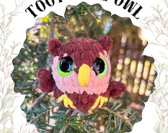 May include: A plush brown owl with large green eyes and a yellow beak. The owl is sitting on a branch of a green tree. The text "Toots the Owl" is written in a circle around the owl.