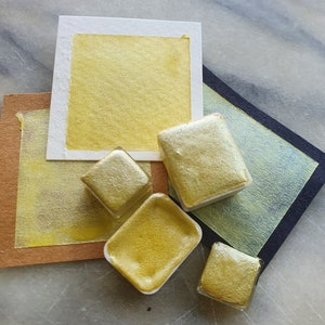 Buttercup handmade watercolor paint in a light shimmer yellow