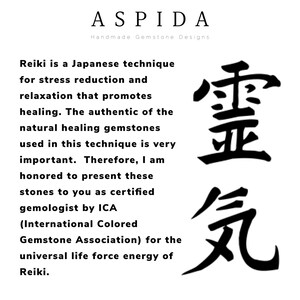 May include: Black and white Japanese characters for the word "Reiki" with a description of Reiki as a Japanese technique for stress reduction and relaxation that promotes healing. The text also mentions that natural healing gemstones are used in this technique and that the seller is a certified gemologist by ICA (International Colored Gemstone Association).