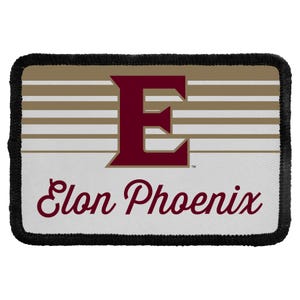 May include: A rectangular patch with a black stitched border. The design features a large maroon letter E centered over horizontal tan and white stripes. Below the letter, the text Elon Phoenix is printed in a maroon cursive script font.