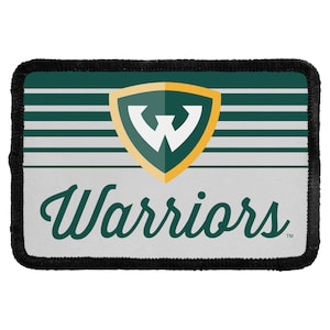 May include: A rectangular patch with a black stitched border. The design features horizontal dark green and white stripes, a central shield emblem with a white letter W, and the word Warriors in a dark green cursive script on a white background.