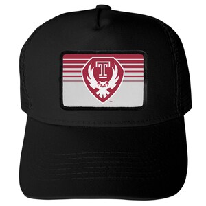 May include: A black trucker hat featuring a rectangular patch on the front. The patch displays a maroon and white graphic of an owl inside a shield, topped with a letter T, set against a background of horizontal maroon and white stripes.