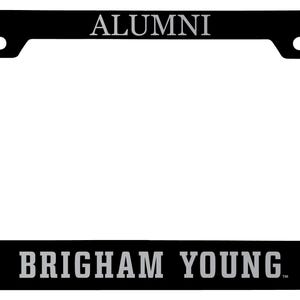 May include: Black license plate frame with the words "ALUMNI" and "BRIGHAM YOUNG" in silver lettering. The frame also features two silver "Y" logos.