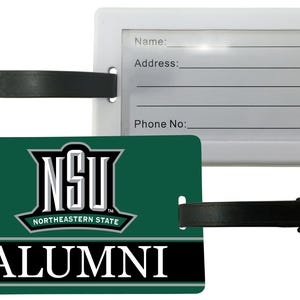 May include: Two luggage tags. One is white with a clear window for name, address, and phone number. The other is green with the text "NSU ALUMNI" and a logo. Both have black straps.