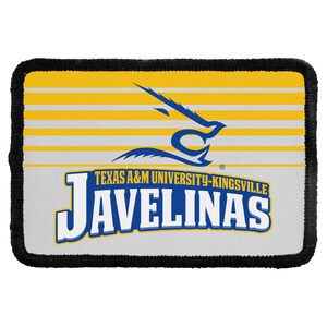 May include: A rectangular patch with a black stitched border featuring horizontal yellow and white stripes. The design includes a blue stylized javelina head logo above the text Texas A&M University-Kingsville Javelinas in blue and white.