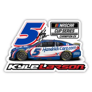 May include: A sticker featuring a blue and white race car with the number 5 and the text "HendrickCars.com". The sticker also includes the text "Kyle Larson" and "NASCAR CUP SERIES CHAMPION 2X".