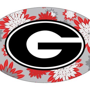 May include: A gray oval with a white and red floral pattern. The center of the oval features a black and white letter "G" with a white outline.