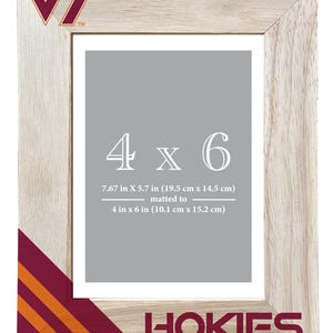 May include: A wooden picture frame with the text "4 x 6" and "HOKIES". The frame is light-colored with maroon and orange accents. The frame dimensions are 7.67 in x 5.7 in (19.5 cm x 14.5 cm), matted to 4 in x 6 in (10.1 cm x 15.2 cm).