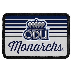 May include: A rectangular patch with a black stitched border featuring a navy blue and white horizontal striped background. The center displays a navy blue and grey crown icon above the letters ODU and the word Monarchs in navy blue script.