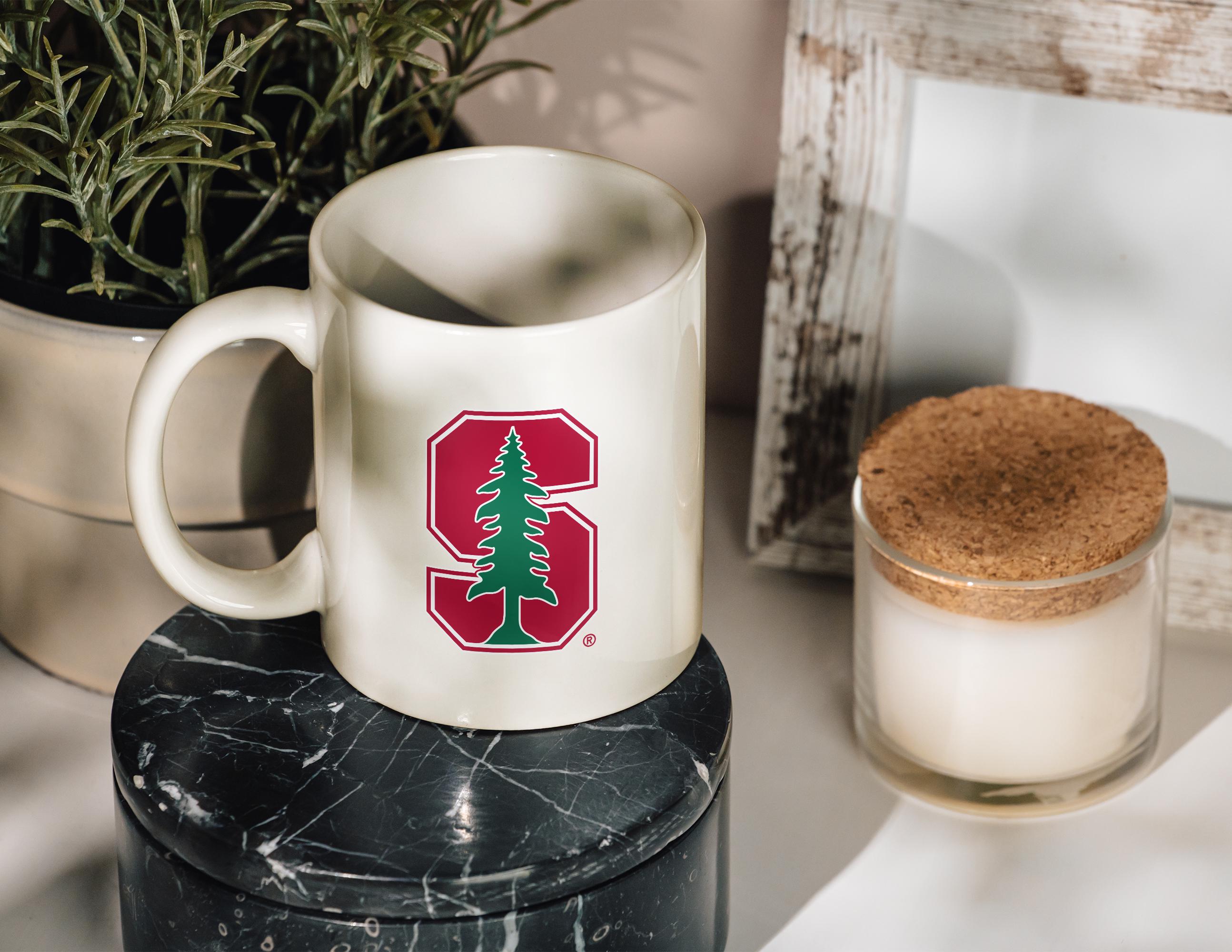 Elon University White Ceramic Mug (White). Officially Licensed Collegiate P Elon University 12 oz White Ceramic Coffee Mug Circle Design