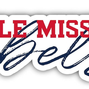 May include: A white sticker with the words "OLE MISS Rebels" in red and navy blue. The word "OLE MISS" is in a block letter font, and "Rebels" is in a cursive font. Red flowers and green stems are on the right side of the sticker.