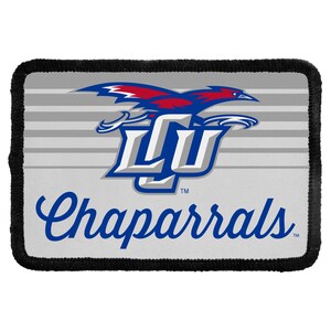 May include: A rectangular patch with a black stitched border featuring a light gray background with horizontal stripes. The design includes a blue and red bird graphic above the letters LU in white and blue, with the word Chaparrals in blue script.