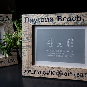 a picture frame with a map of daytona beach