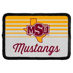 May include: A rectangular patch with a black stitched border featuring a yellow and white horizontal striped background. It displays a maroon MSU logo overlaid on a yellow outline of the state of Texas, with the word Mustangs in maroon script below.
