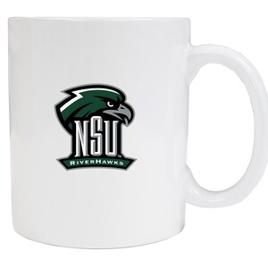 May include: White ceramic coffee mug with a green and black logo of a hawk with the text "NSU RIVERHAWKS" underneath.