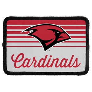 May include: A rectangular fabric patch with a black stitched border. The design features a red cardinal bird head logo above the word Cardinals in red script. The background consists of horizontal red and white stripes on the top half.