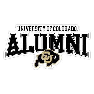 May include: A white sticker with the words "UNIVERSITY OF COLORADO" above the word "ALUMNI" in bold black letters. A gold and black buffalo logo is below the word "ALUMNI".