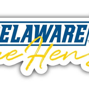 May include: A white sticker with the words "DELAWARE Blue Hens" in blue and yellow. The word "DELAWARE" is in a blue rectangle. Yellow script lettering spells out "Blue Hens". A floral design with yellow flowers is on the right.
