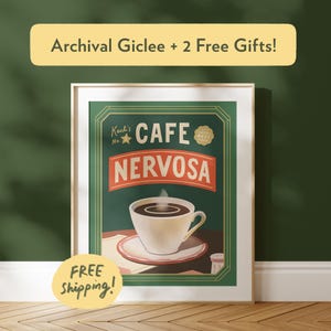 May include: A framed vintage-style print featuring a coffee cup with steam rising, set against a green background. The print reads "Cafe Nervosa" and includes the text "Archival Giclee + 2 Free Gifts!"