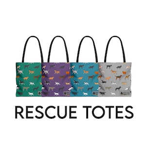 May include: Four tote bags with black handles and colorful dog patterns. The bags feature a variety of dog breeds on backgrounds of green, purple, teal, and gray. The text "RESCUE TOTES" is displayed in large black letters below the bags.