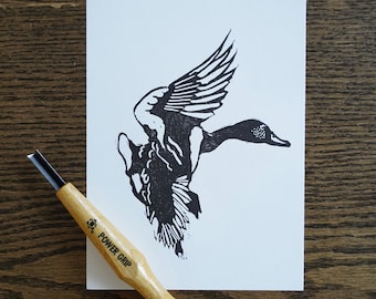 Duck in flight linocut print hand printed