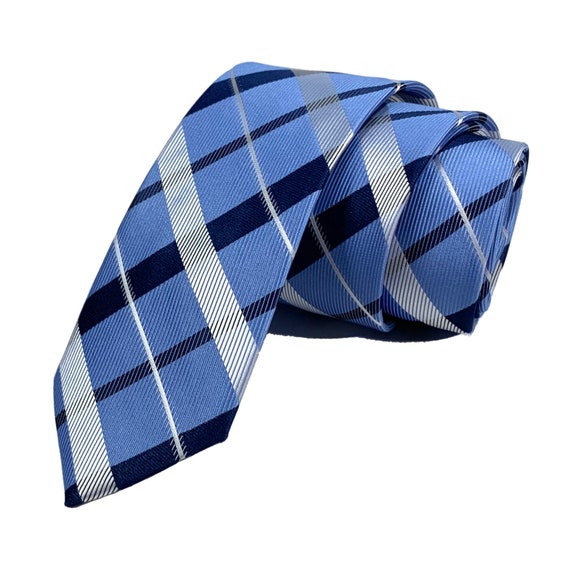 White and dark blue diagonal striped plaid tie on blue background 2.36 6cm
