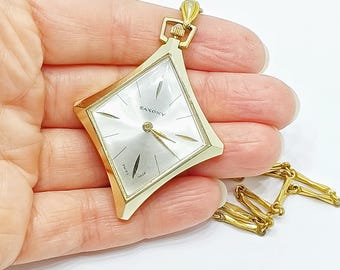 Collana con ciondolo a forma di diamante, vintage, di fabbricazione svizzera Saxony, anni '50-'60, color oro, a carica manuale, funzionante.