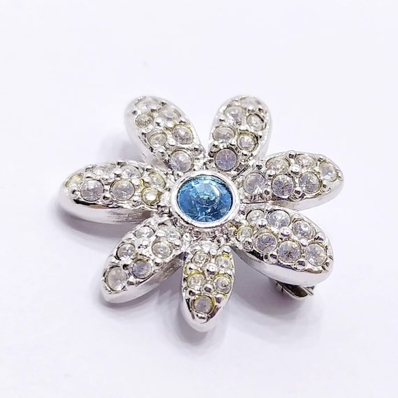 Vintage small silver tone floral brooch with sky blue crystal center Clear crystal silver pin SWAROVSKI clear rhinestone flower brooch pin