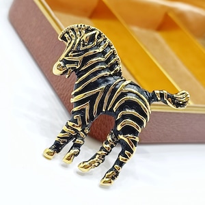 Vintage black enamel figural zebra brooch Retro collectible black and gold animal pin Large coat brooch