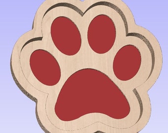 May include: A wooden paw print design with a red center and a light brown border. The paw print has a three-dimensional effect, with a darker outline. The background is a light blue color.
