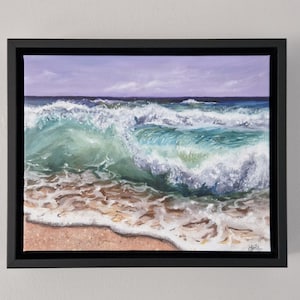May include: Oil painting depicting a breaking wave in turquoise, blue, and white hues. The wave crashes onto a sandy beach, set against a purple sky. The artwork is presented within a black rectangular frame.