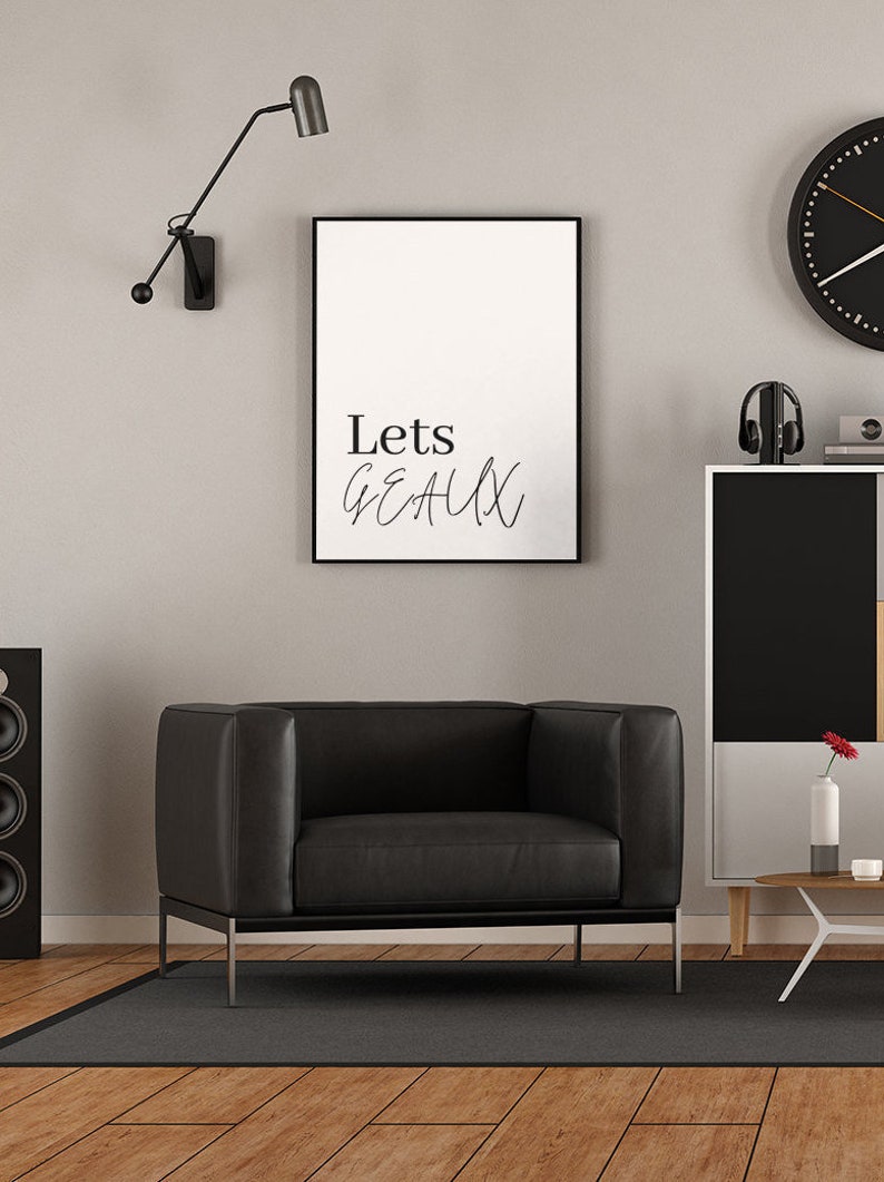 K&ouml;nnte beinhalten: Schwarz-wei&szlig; gerahmtes Wandbild mit dem Text "Lets Get Lit" in einer modernen Schriftart.