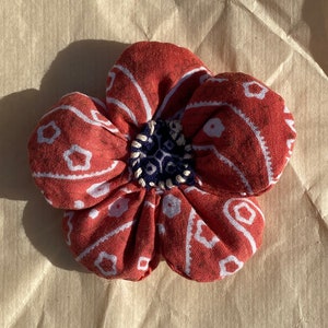 Handmade Bleached Red Bandana Flower with Navy Bandana Center