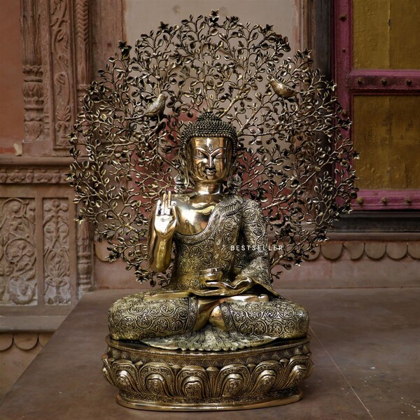 brass buddha statue sitting on base with tree Brass clear colour finish