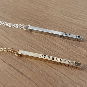 She is clothed in Strength & Dignity | Hand Stamped Christian 3D Turner Necklace | Silver or Gold (17.5 Inch)