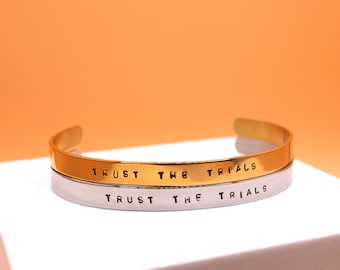 Trust the Trials | Hand Stamped Adjustable Stainless Steel Cuff Bracelet | Gold or Silver