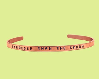 Stronger than the storm | Hand Stamped Adjustable meaningful Thin Cuff Bracelet | Gold