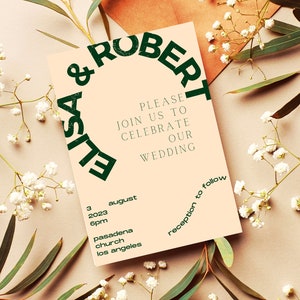 May include: A peach-colored wedding invitation with green text. The text reads "ROBER & ELISA" in a circle at the top, followed by "PLEASE JOIN US TO CELEBRATE OUR WEDDING". The date, time, and location are listed below: "3 AUGUST 2023 6PM PASADENA CHURCH LOS ANGELES". The text "reception to follow" is written in a circle at the bottom right corner.