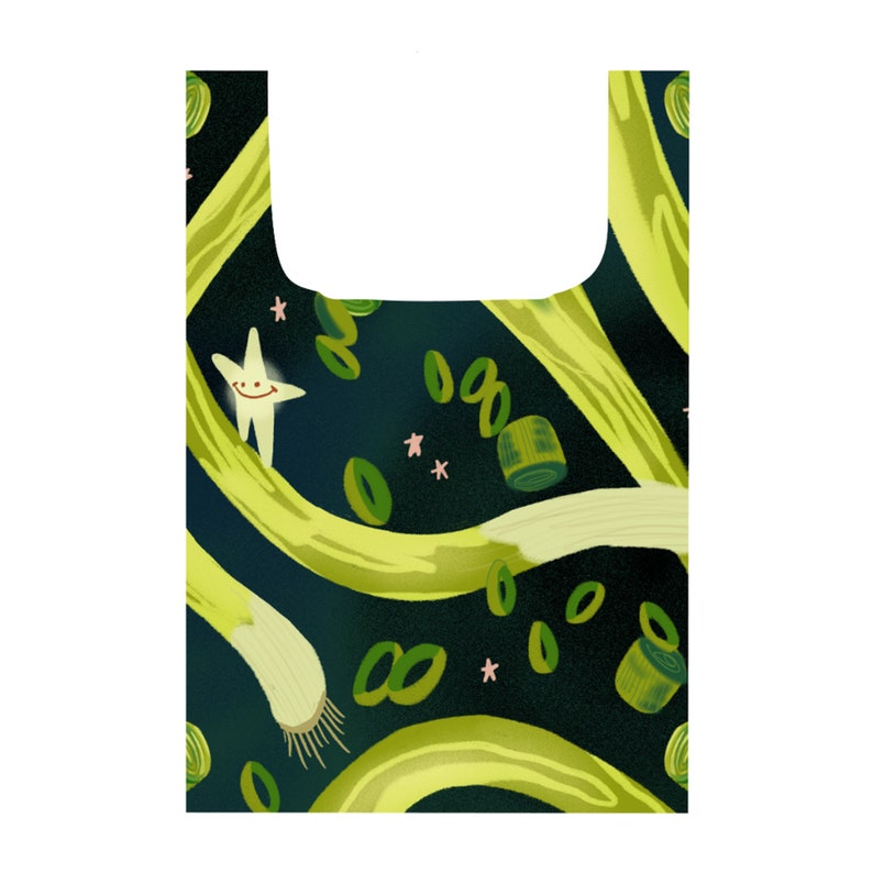 May include: A green reusable grocery bag with a pattern of green onions, green onion rings, and stars on a dark blue background.